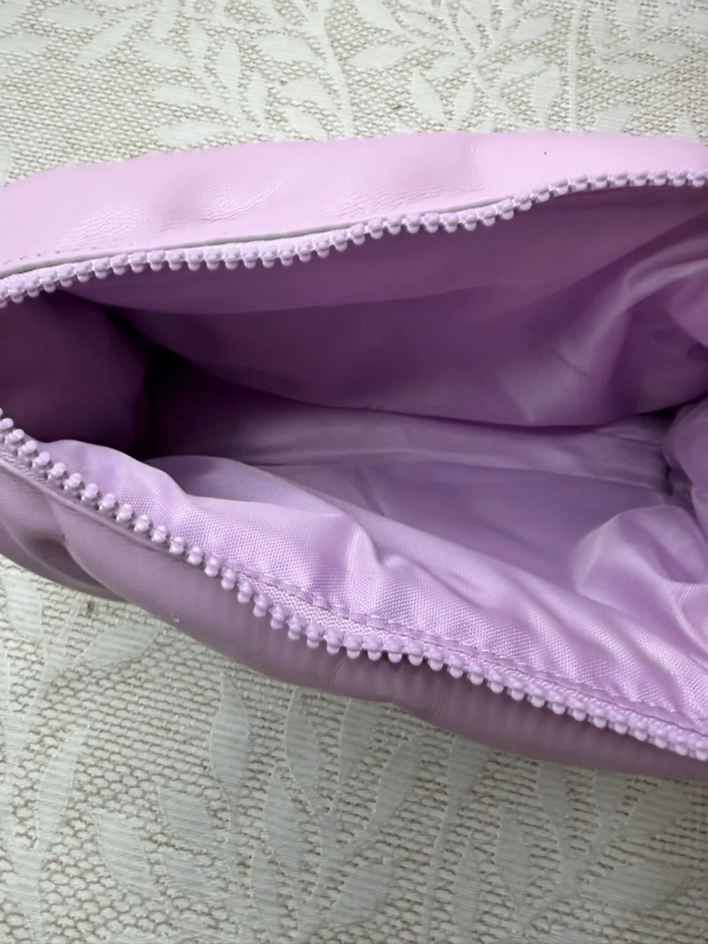 Drunk Elephant purple Lavender puffer pouch. Makeup Travel Bag